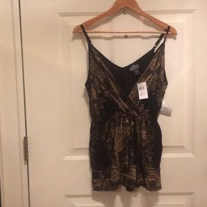 A gold and black romper!